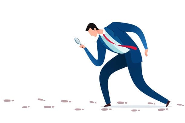 man following footprints Where to Find a Private Investigator
